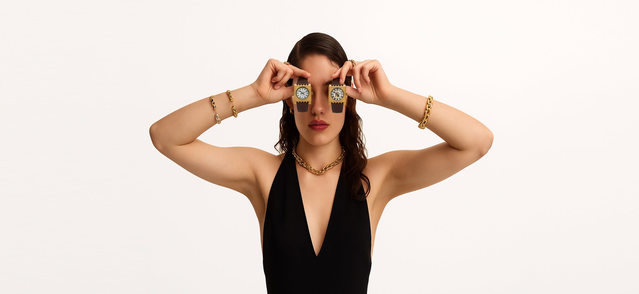 Woman wearing gold earrings and a black dress holding Dent London Parliament on a white background